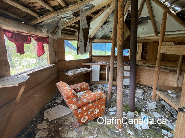 Interior of cabin with old chair at Comet Creek Resort in the Cariboo between Likely and Barkerville #olafincanada #britishcolumbia #discoverbc #abandonedbc #cariboo #cometcreekresort