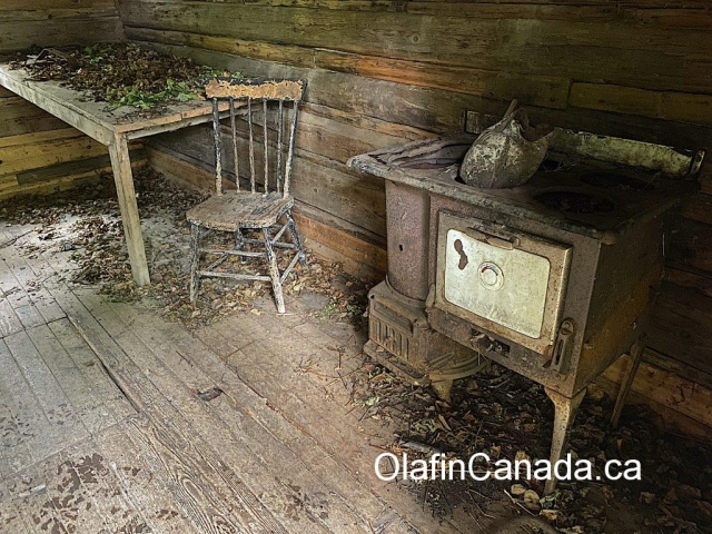Stove and chair found in a cabin at Quesnel Forks #olafincanada #britishcolumbia #discoverbc #abandonedbc #cariboo #quesnelforks