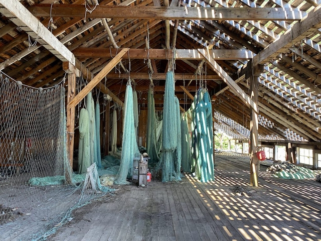 Nets hanging to dry on the first floor of the cannery #olafincanada #britishcolumbia #discoverbc #abandonedbc #tallheocannery #bellacoola